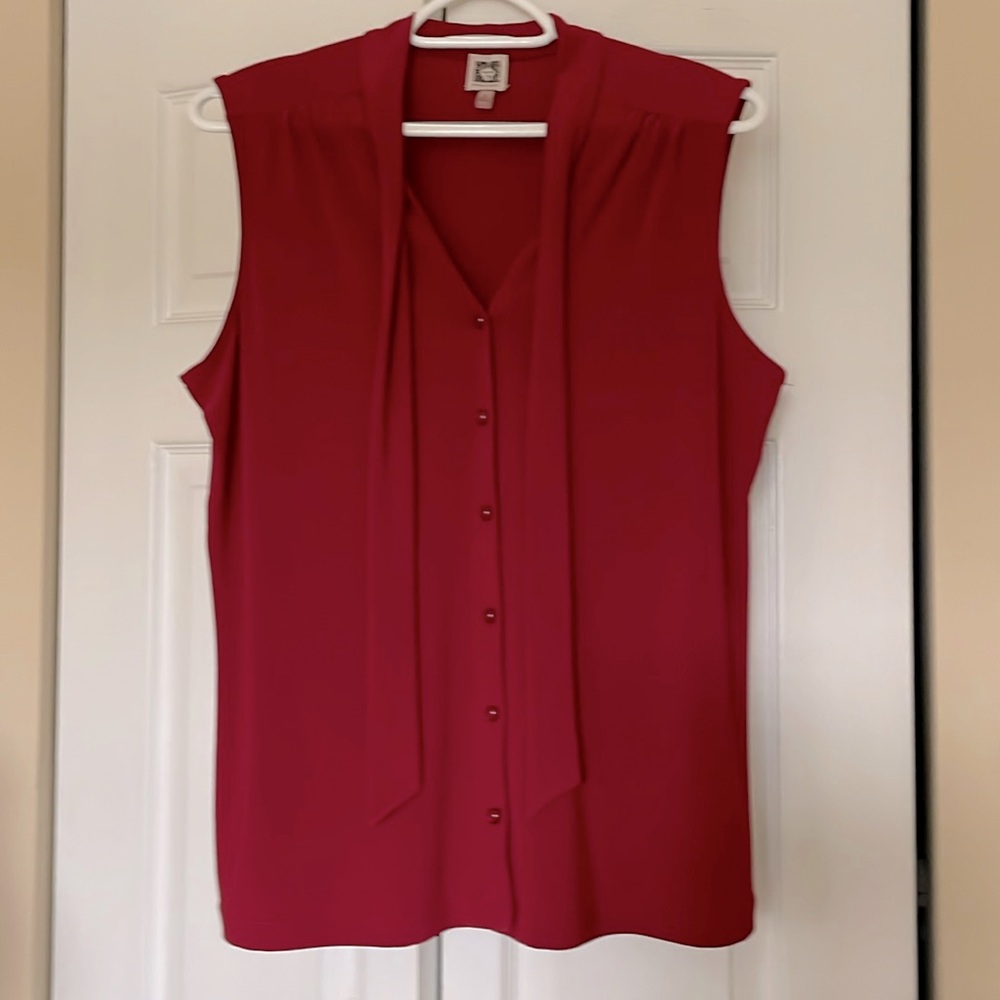 Anne Klein sleeveless button down top. Accent tie at neck. Pretty red color.